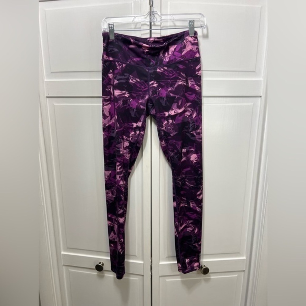 Reebok, purple and pink leggings. Size small.